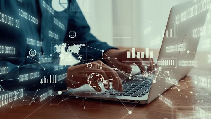 businessman-uses-capable-laptop-computer-analyze-business-data-analytic